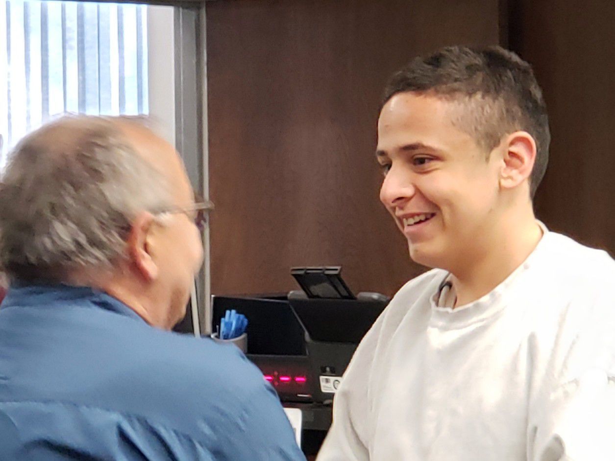 Rodriguez-Romero in court smiling (Sept)